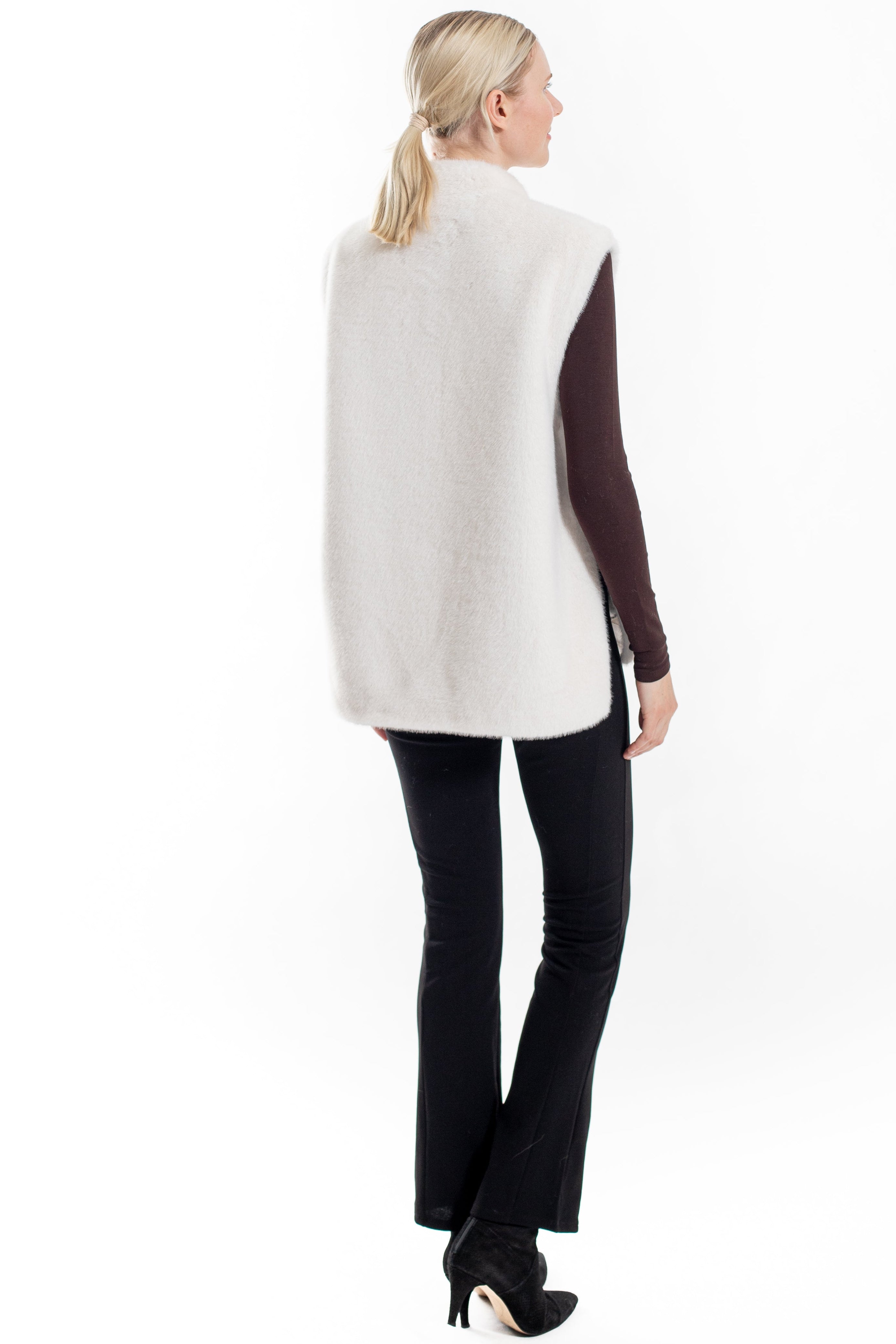 Saskia-  Faux mink vest with side slits and snap closure