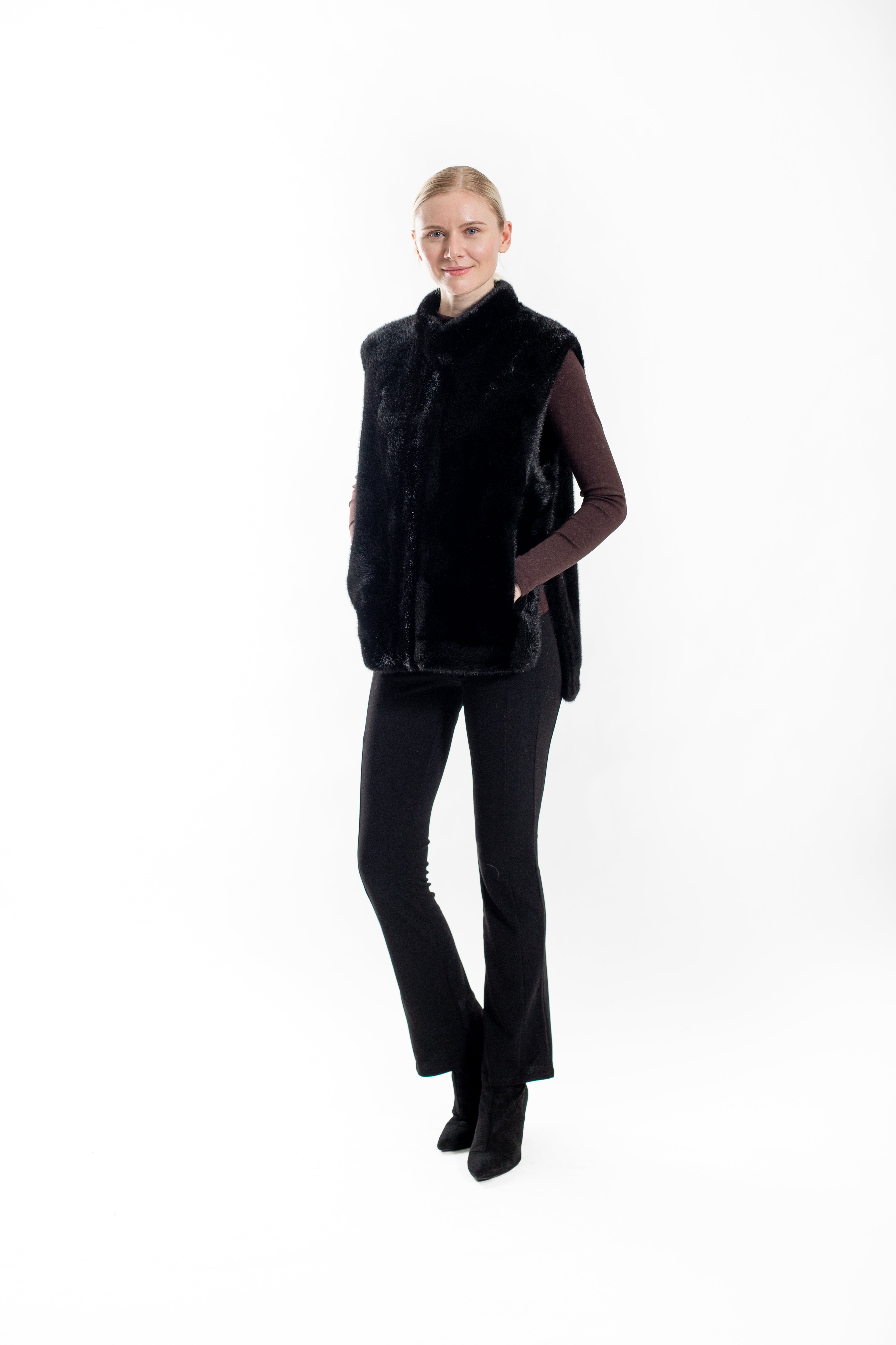 Saskia-  Faux mink vest with side slits and snap closure