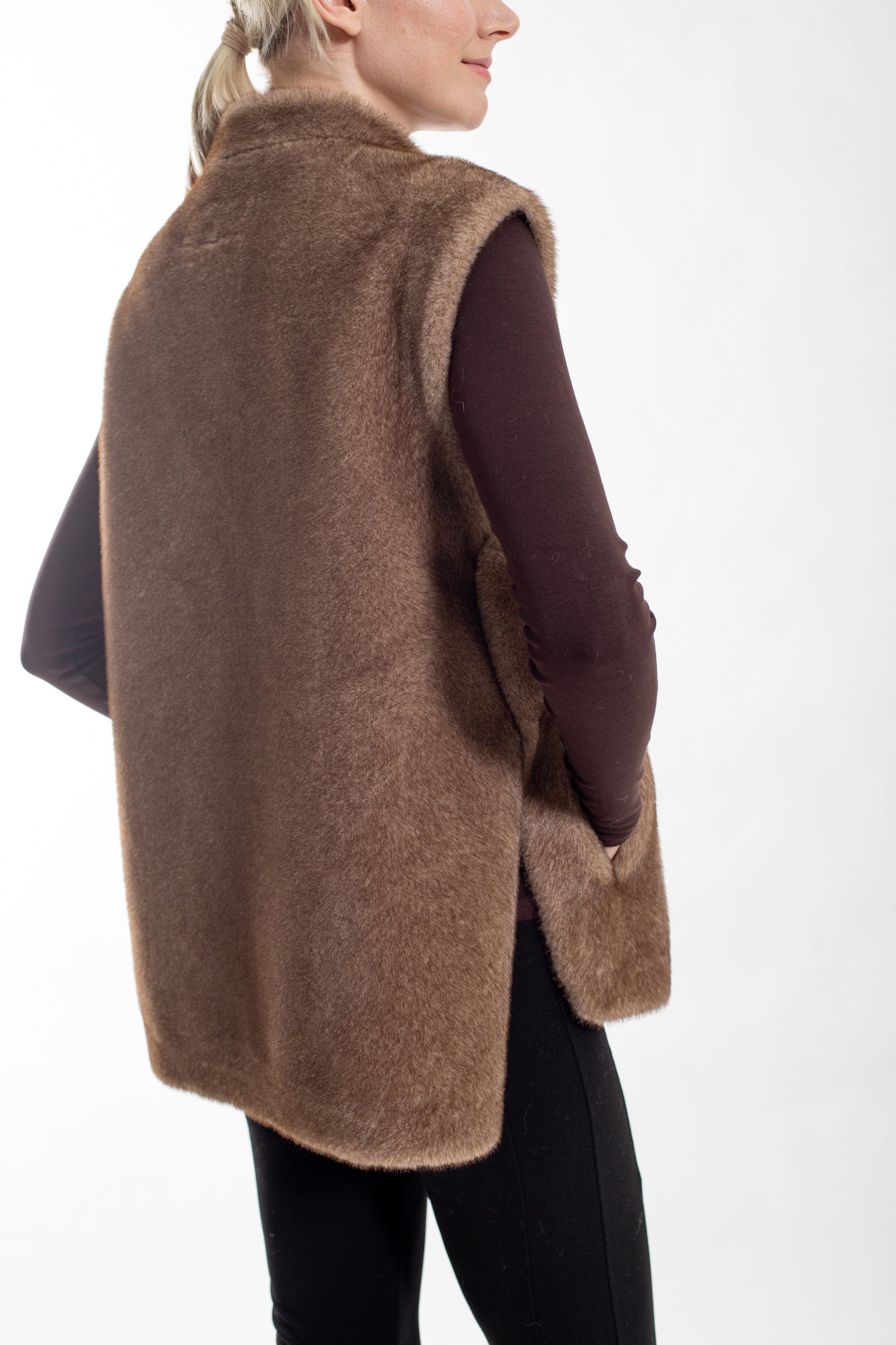 Saskia-  Faux mink vest with side slits and snap closure